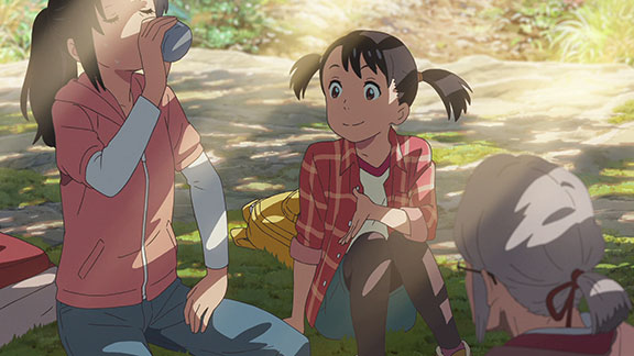 Miyamizu family relaxing outdoors.